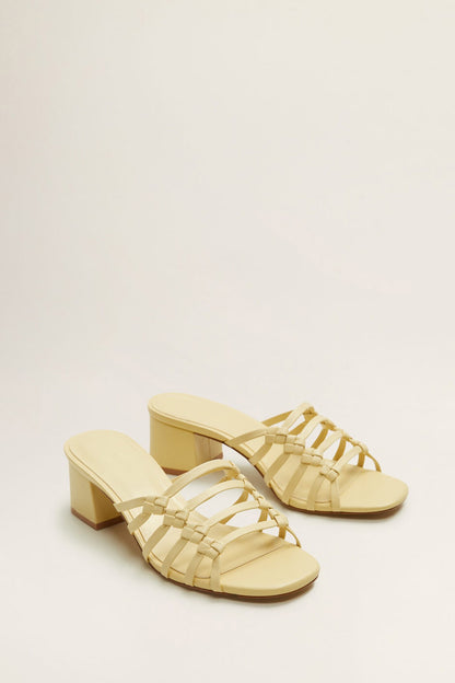 MANGO pastel yellow strappy heeled sandals with block heel and crisscross straps