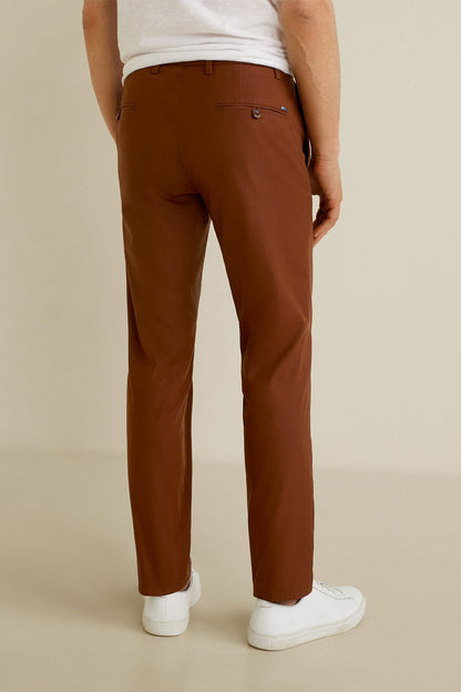 Brown straight-leg trousers with front pockets and belt loops