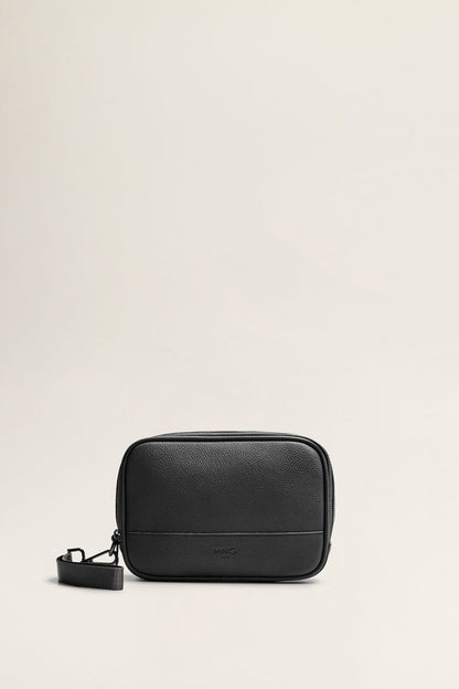 Black mini crossbody bag with front zipper, top handle loop, logo