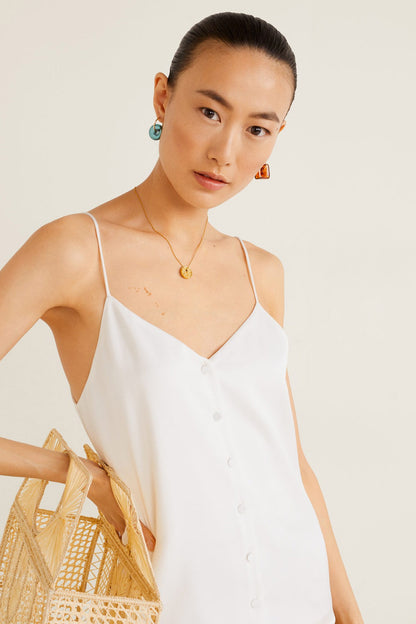 Off-white spaghetti-strap camisole top with V-neckline and front buttons