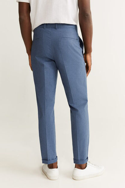Dark navy back-view cuffed trousers with tapered fit