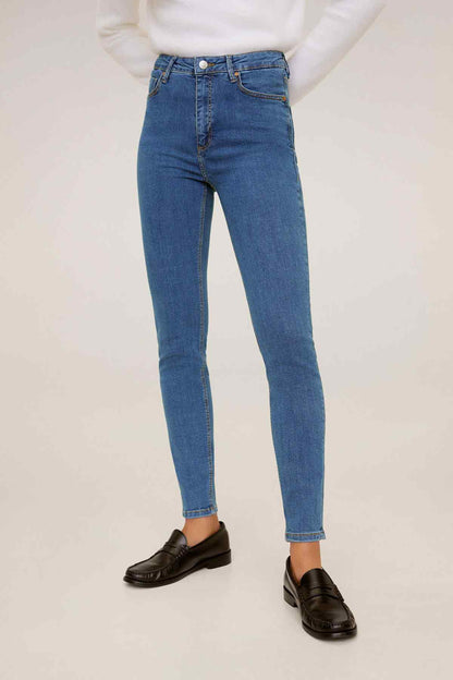 Medium blue denim jeans with button fly, slim straight legs and five-pocket design