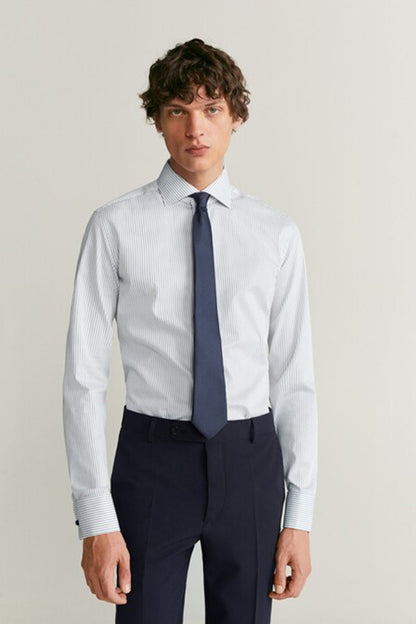 White striped dress shirt with spread collar and button cuffs