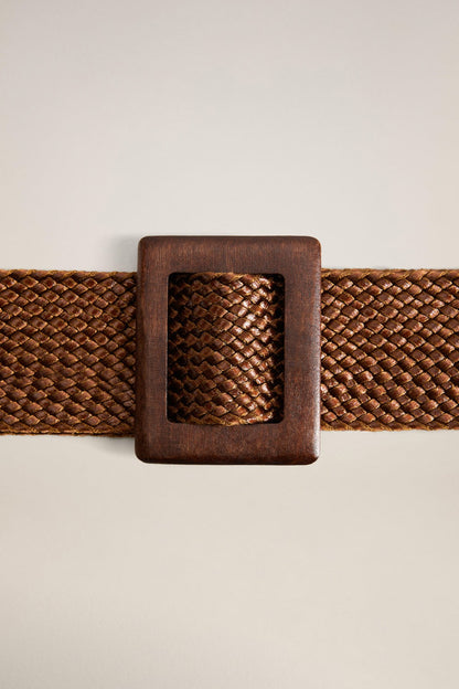 Medium brown woven belt with square rectangular buckle close-up