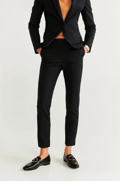 Black blazer and trousers, tailored lapels and slim ankle-length fit
