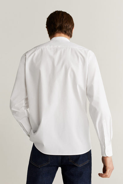 White button-up long-sleeve shirt from the back with yoke and collar