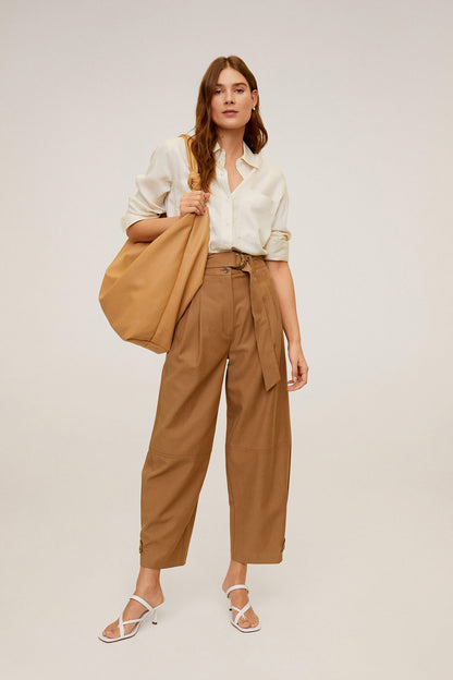 Mango ecru button-up blouse with brown high-waist cropped trousers and belt, front view