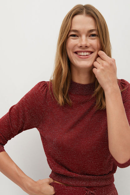 Red textured lounge set with long-sleeve crewneck top and wide-leg pants
