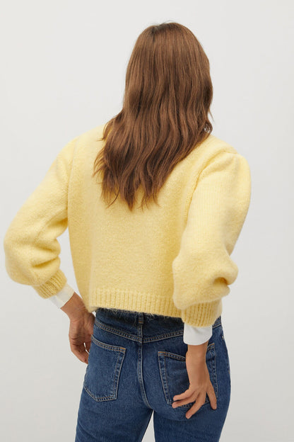 Pastel yellow knit sweater, crew neck, ribbed cuffs and hem