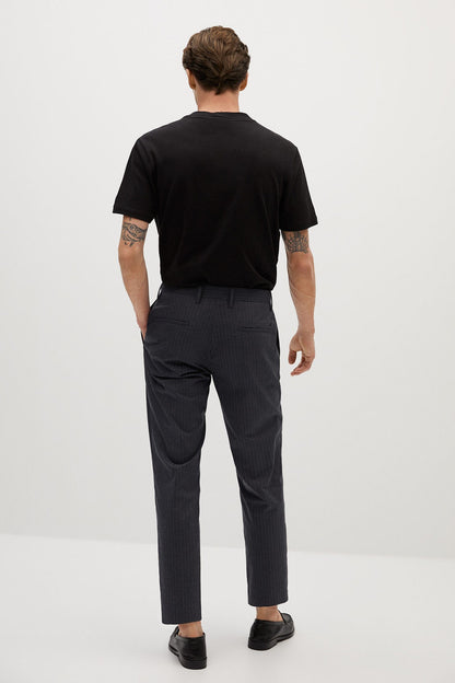 Dark heather grey pinstripe trousers, back view with tapered leg and belt loops