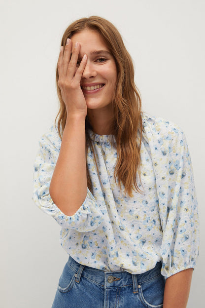MANGO off-white and light blue floral blouse with puff sleeves and round neckline