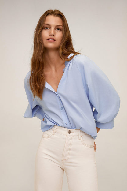 Sky-blue button-front blouse with puff sleeves