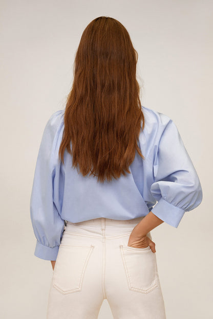 Sky-blue button-front blouse, back view with puff sleeves