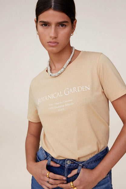 Beige short-sleeve T-shirt with BOTANICAL GARDEN graphic and crew neckline