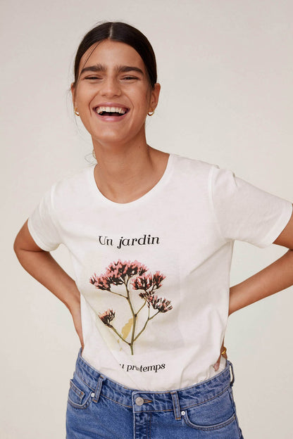Off-white T-shirt with floral graphic print and cursive text
