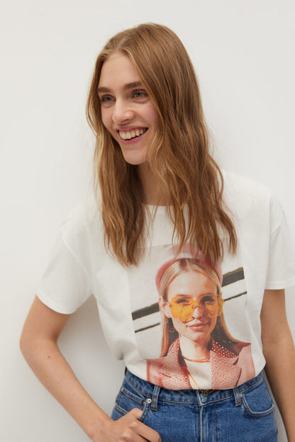 White graphic T-shirt with portrait print on front, short sleeves