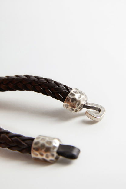 Braided dark brown bracelet with silver-toned hammered links and ring clasp