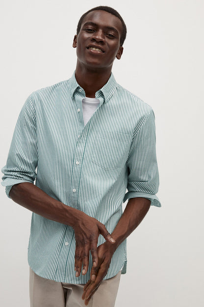 Light blue and white striped button-up shirt with collar and button cuffs