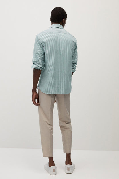 Light blue and white striped button-up shirt, back view with button cuffs