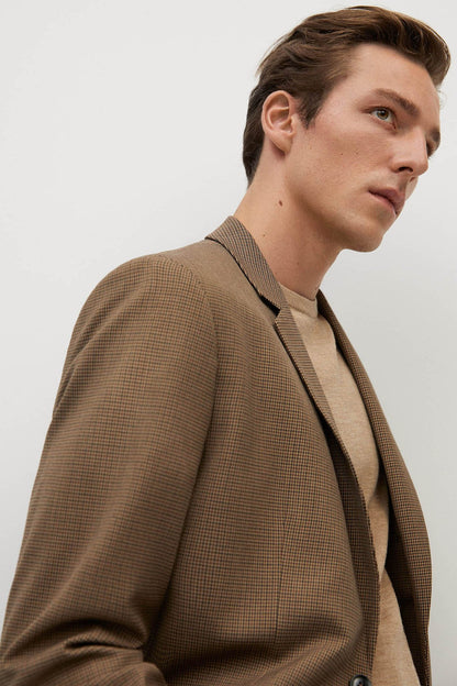 Brown check blazer with raised collar and buttoned front detail