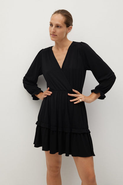 Black V-neck long-sleeve mini dress with tiered ruffle hem and gathered waist
