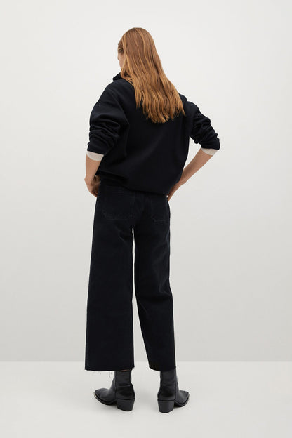 Black denim jacket, back view, zip front and cropped length