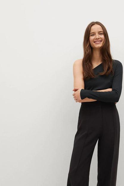Black sleeveless jumpsuit with wrap neckline and straight-leg trousers