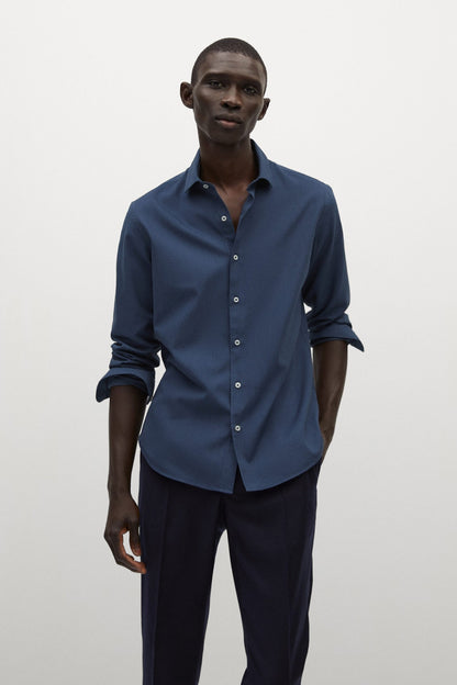 Navy long-sleeve button-up shirt with buttoned placket and pointed collar