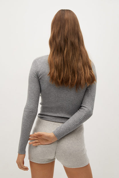 Grey ribbed knit long-sleeve top and matching shorts, back view