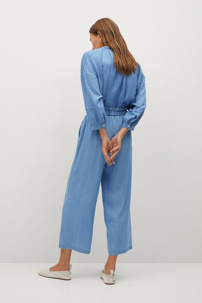 Light blue denim wide-leg pants, back view, elastic waist and button cuffs