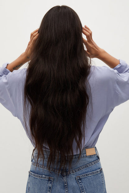 Light blue button-up shirt, back view with long sleeves and collar