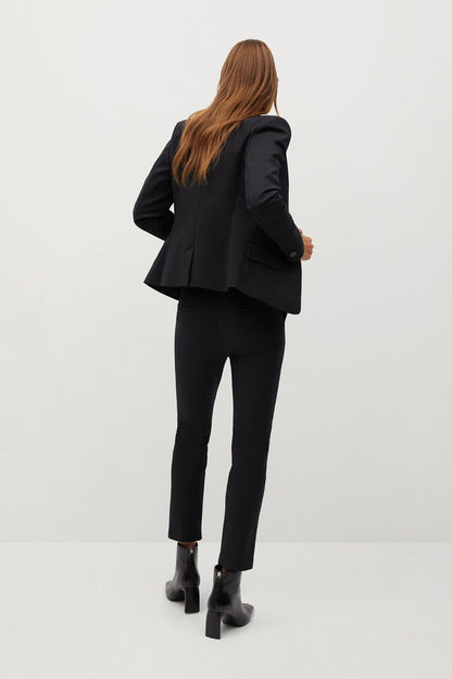 Black tailored trousers with straight slim legs and back seam