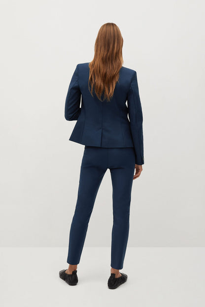 Navy tailored blazer and slim trousers set, back view with buttoned jacket