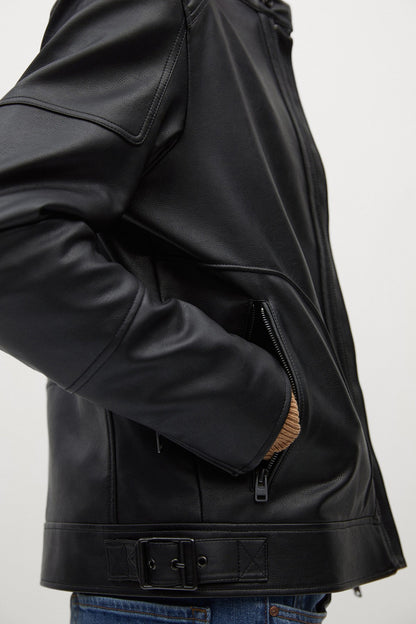 MANGO black leather jacket detail: sleeve pocket zipper and side buckle strap