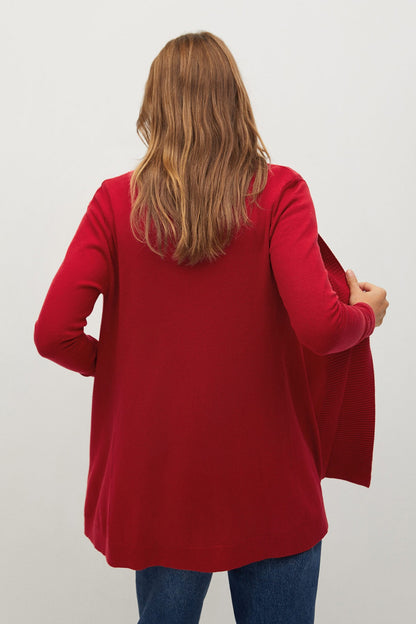 Red textured knit tunic top, V-back view, long sleeves, slightly curved hem