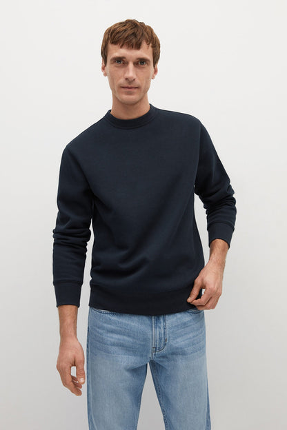 Men's dark navy crewneck sweatshirt with long sleeves and ribbed cuffs