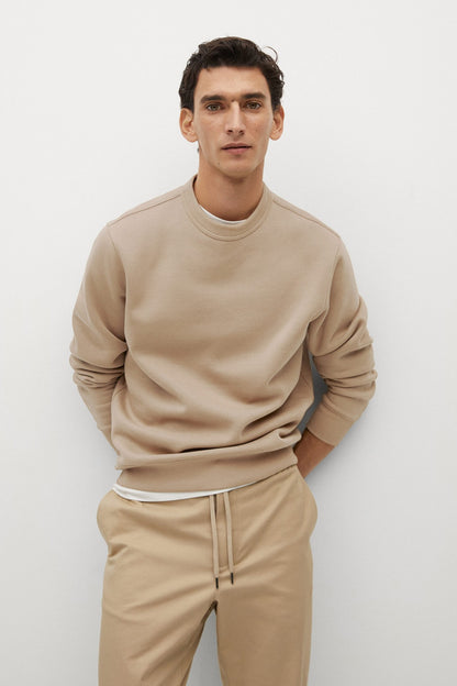 Men's beige crewneck sweatshirt with long sleeves and matching drawstring sweatpants