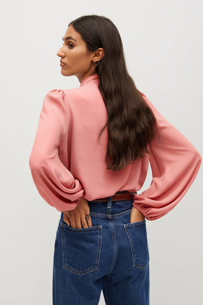 MANGO pink blouse back view with long, loose sleeves
