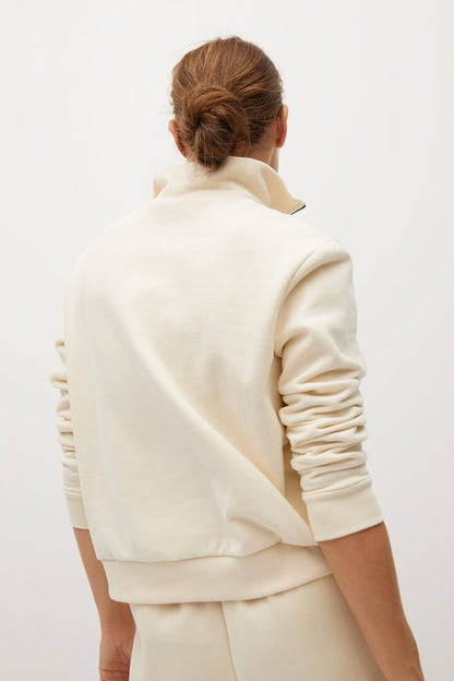 Ecru half-zip sweatshirt back view with ribbed waistband and cuffs