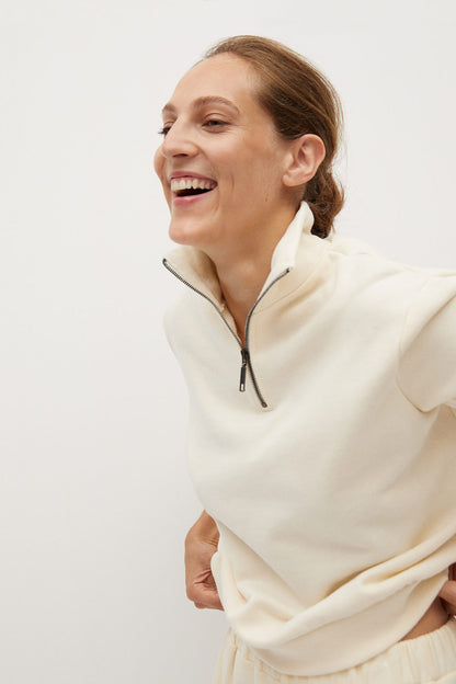 Ecru half-zip sweatshirt with stand collar and drawstring