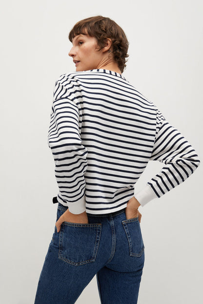 Navy-and-white striped long-sleeve top, back view