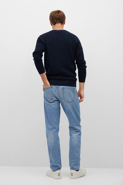 Navy crewneck sweater, long sleeves, ribbed hem and cuffs (back view)
