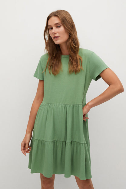 MANGO green tiered mini dress with short sleeves and crew neckline