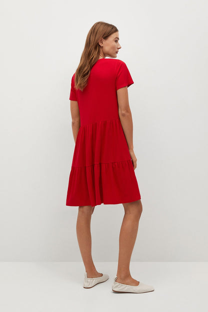 Red short-sleeve tiered mini dress, back view, relaxed fit