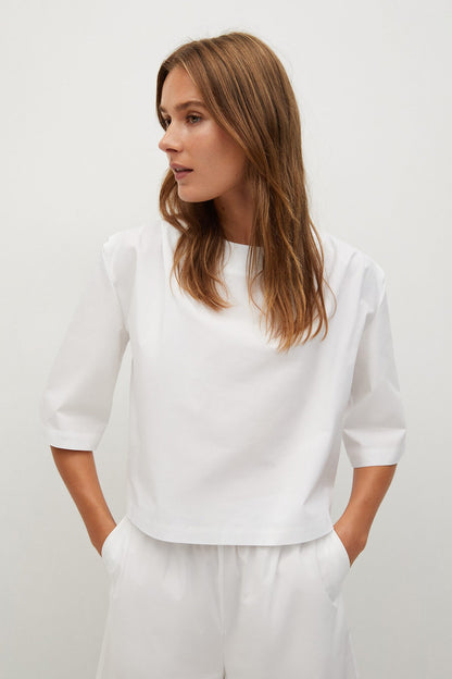 MANGO white blouse with elbow-length sleeves and round neckline
