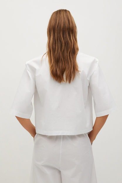 MANGO white blouse, back view, three-quarter sleeves and gathered waist