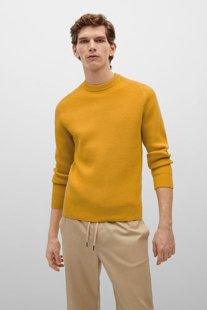 Yellow knit crewneck sweater with long sleeves