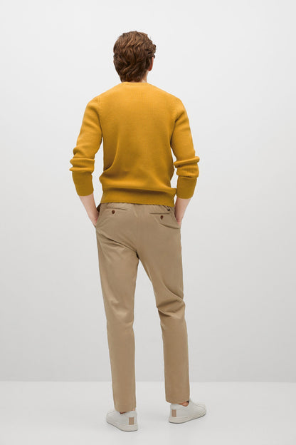 Yellow knit crewneck sweater, back view with long sleeves