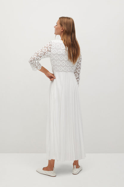 White long-sleeve midi dress with lace patterned yoke and pleated gathered skirt, back view
