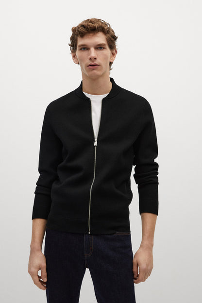 Black zip-up jacket with stand collar and silver chain zipper